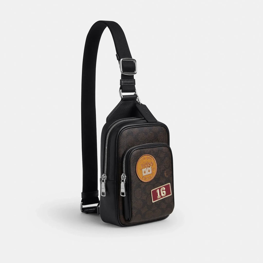 Coach Outlet Racer Sling Pack In Signature Canvas With Patches