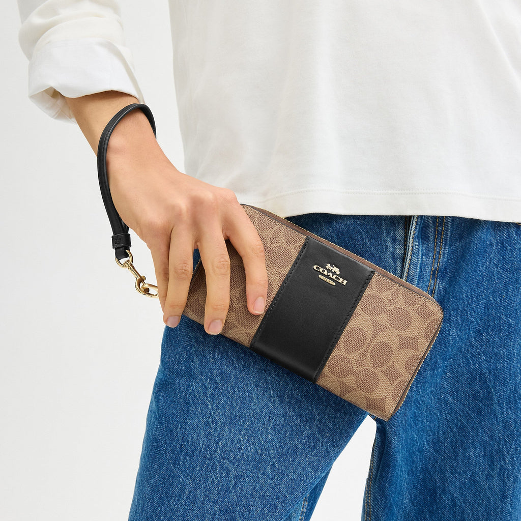 Coach Outlet Long Zip Around Wallet In Signature Canvas With Stripe