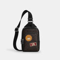 Coach Outlet Racer Sling Pack In Signature Canvas With Patches