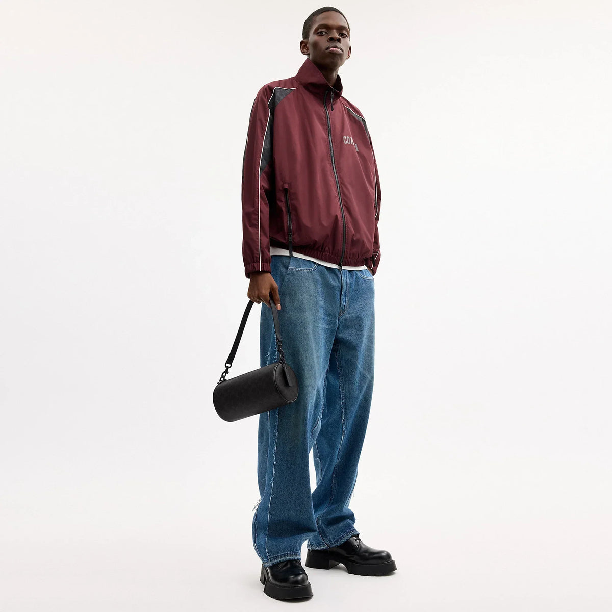 Coach Outlet Andre Barrel Bag 24 In Signature Canvas