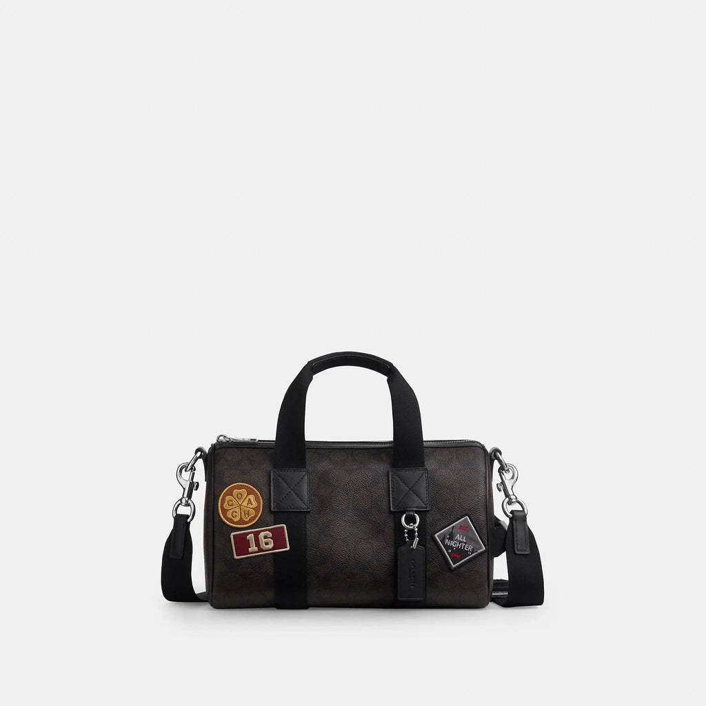 Coach Outlet Explorer Duffle Bag 28 In Signature Canvas With Patches
